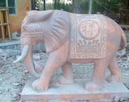 石雕刻大象-大象石雕背部如意
