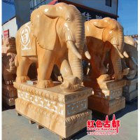 青石雕刻大象-人背大象雕塑的广场