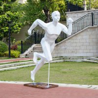 白色块面抽象跑步人物雕塑摆件