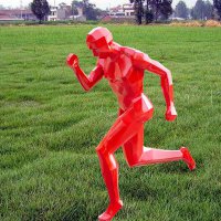 草坪跑步人物雕塑
