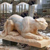 晚霞红金钱豹石雕-公园园林草坪动物雕塑