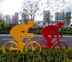 城市不锈钢骑单车人物雕塑