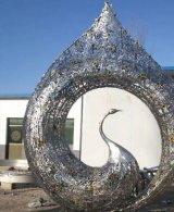 不锈钢广场抽象镂空孔雀雕塑