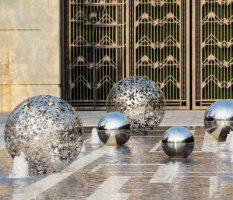户外不锈钢花形镂空球喷泉雕塑