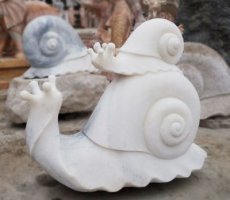 母子蜗牛石雕-浮雕蜗牛