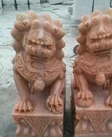 晚霞红传统狮子石雕