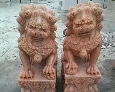 晚霞红传统狮子石雕