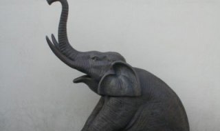 公园坐着的大象喷水动物铜雕