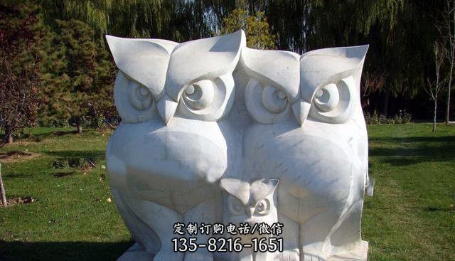 公园猫头鹰石雕图片