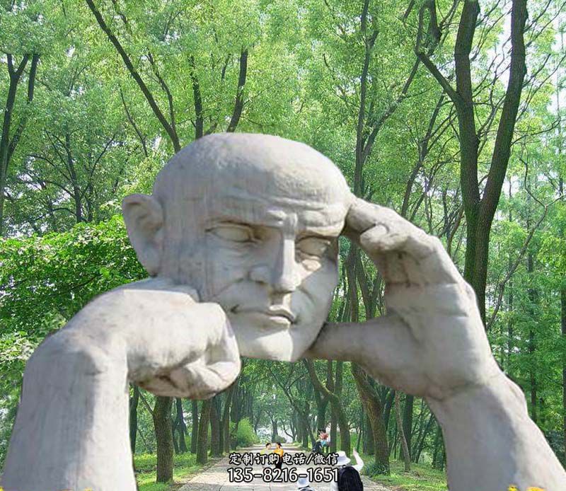 公园抽象人物拱门石雕图片