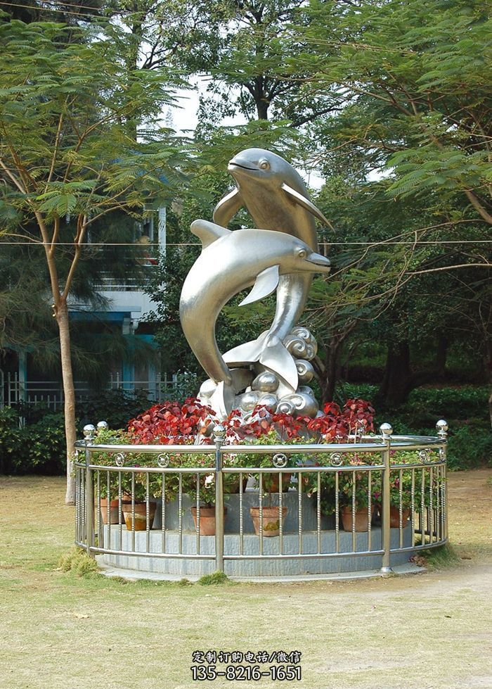 公园不锈钢踏浪海豚雕塑