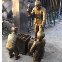 步行街卖玩具的人物小品铜雕