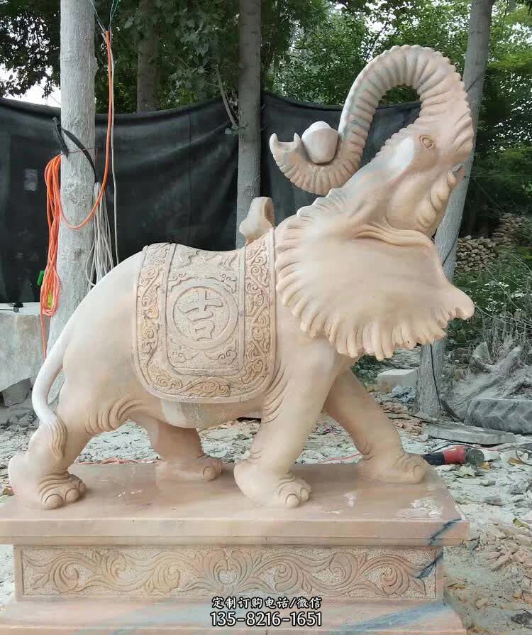 晚霞红卷元宝大象雕塑