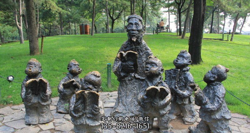 公园读书的儿童人物铜雕
