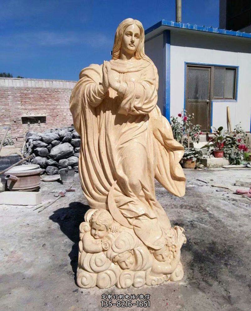 西方教堂宗教美女晚霞红石雕像图片